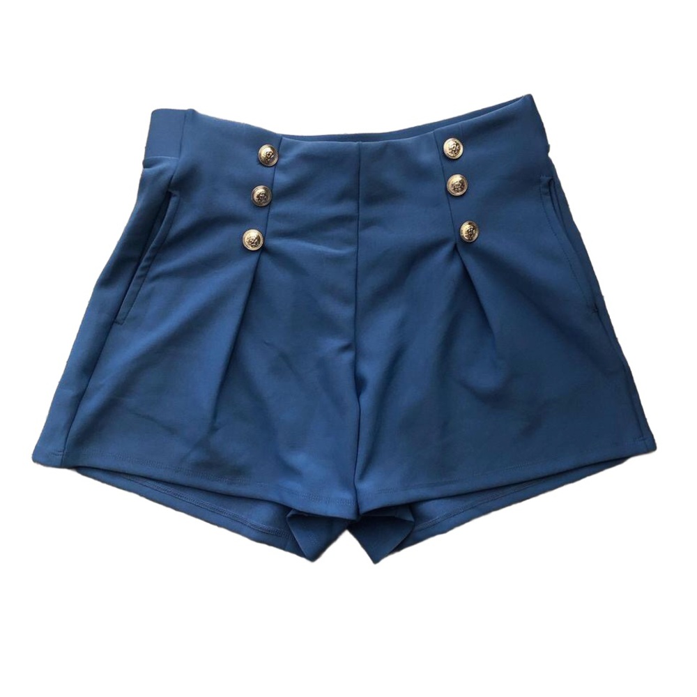 Blue high-waisted shorts with silver buttons and pleats and pockets